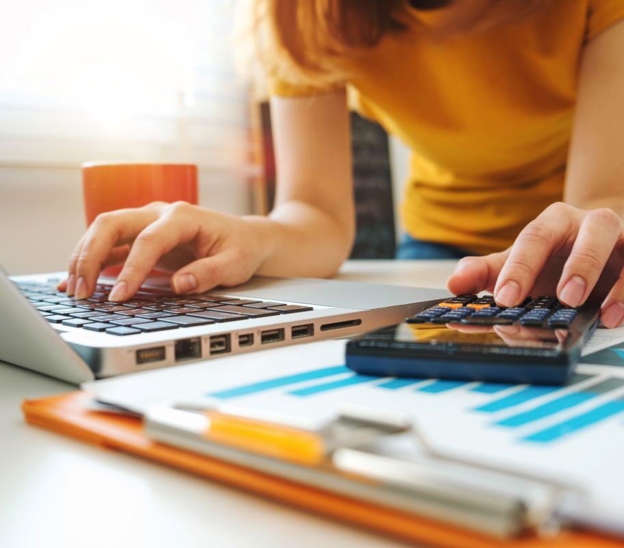 woman using calculator