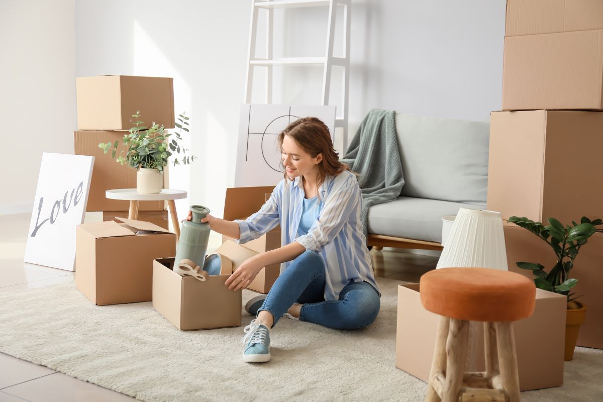 woman unpacking boxes